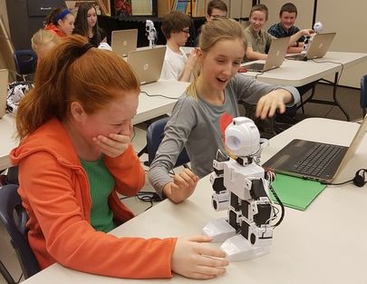 Girls programming Humanoid Robot